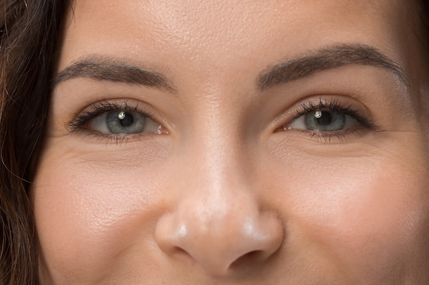 Beautiful female half face portrait.