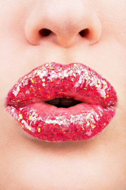 beautiful female lips with shiny red gloss lipstick