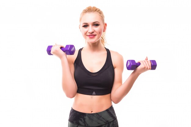 Beautiful fitness woman do exercises isolated on white