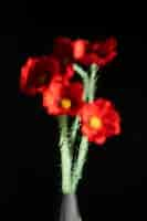 Free photo beautiful flowers seen behind humidity glass