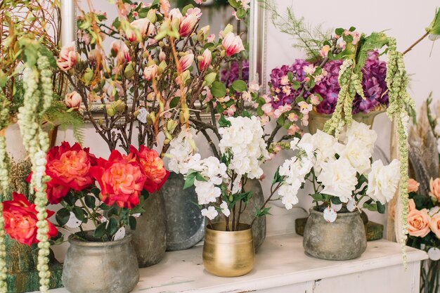 Beautiful flowers on shelf