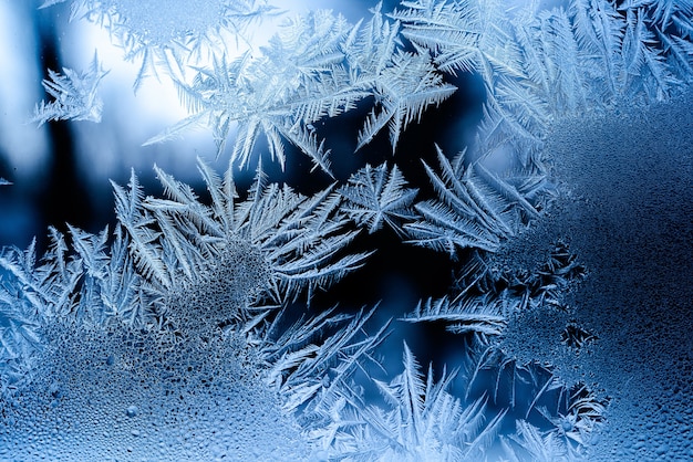 Free photo beautiful frost pattern on a window