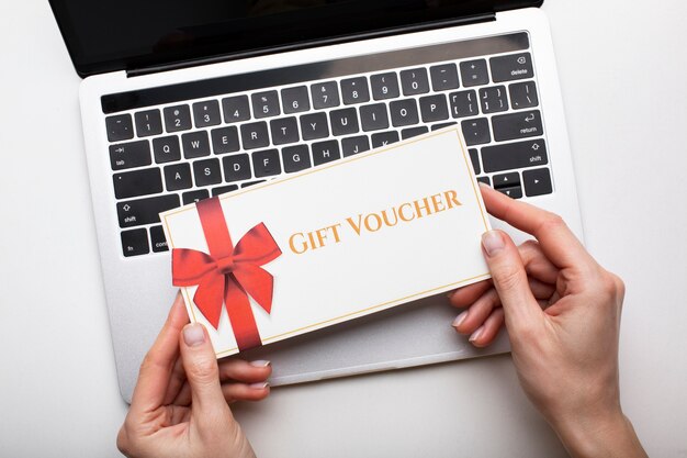 Beautiful gift voucher with hand