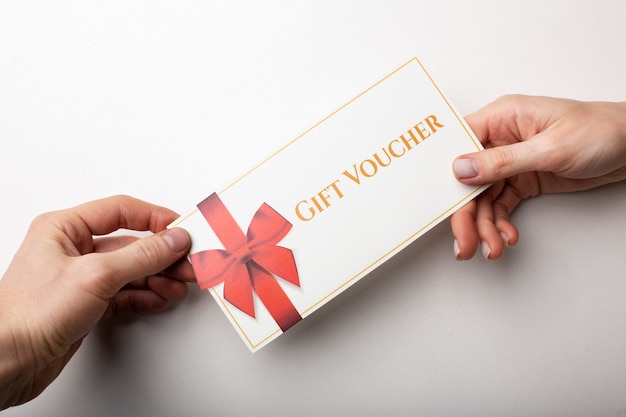 Beautiful gift voucher with hand