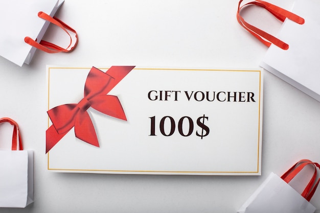 Free photo beautiful gift voucher with hand