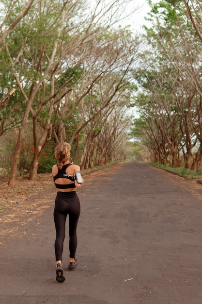 Beautiful girl go in for sports. autumn. bali