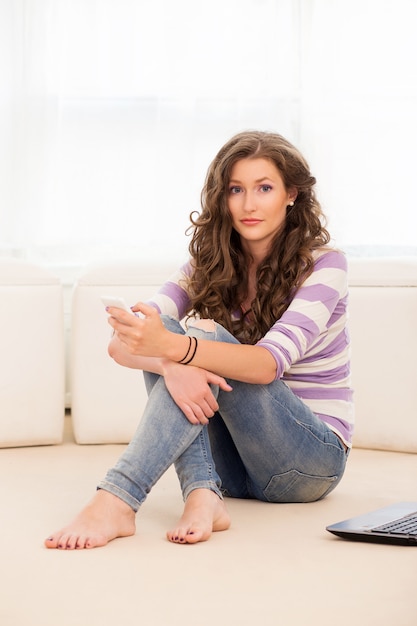 Beautiful girl lying on the floor