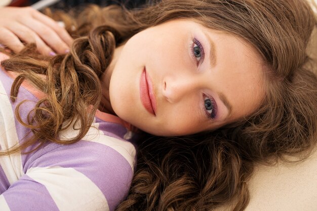 Beautiful girl lying on the floor 