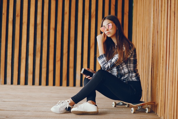 A beautiful girl near wall