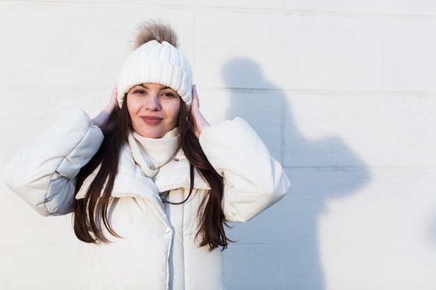 Free photo beautiful girl in outwear outside