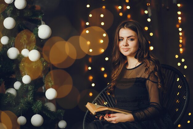 Beautiful girl reading a book