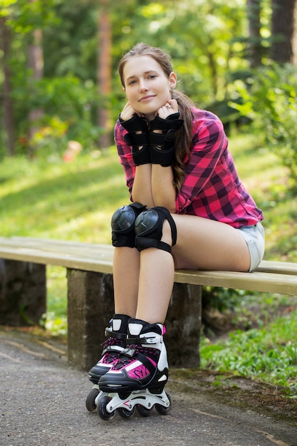 Beautiful girl on rollerblades