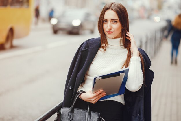 Beautiful girl walking in the city