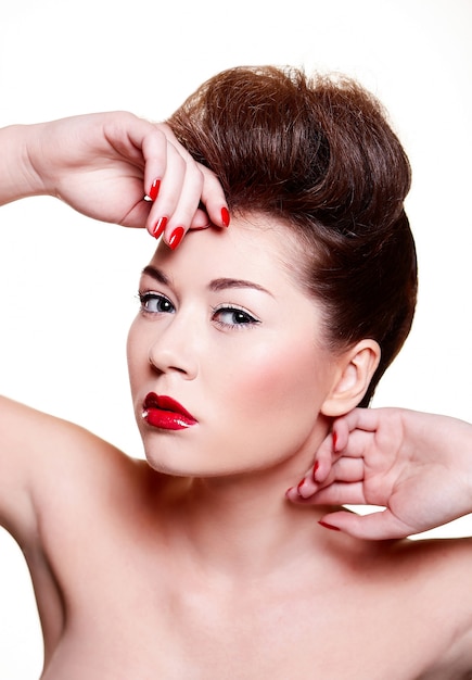 beautiful girl with red lips and nails