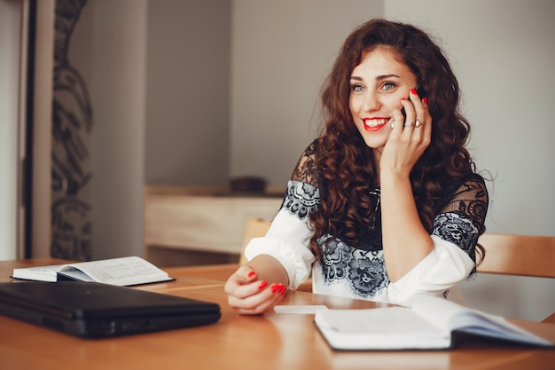 Beautiful girl works in the office