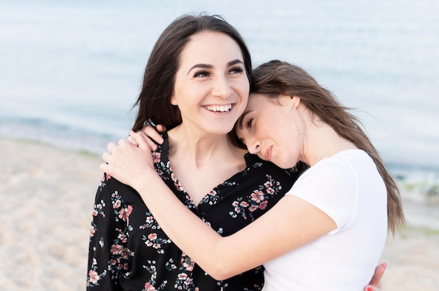 Free photo beautiful girls having fun at beach