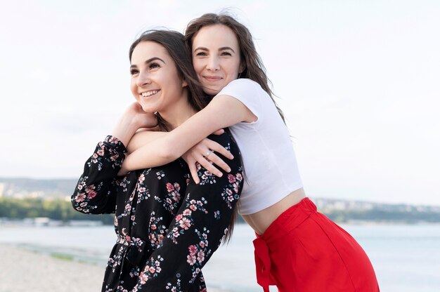 Beautiful girls having fun at beach