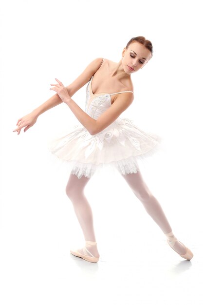 Beautiful and gorgeous ballerina in ballete pose