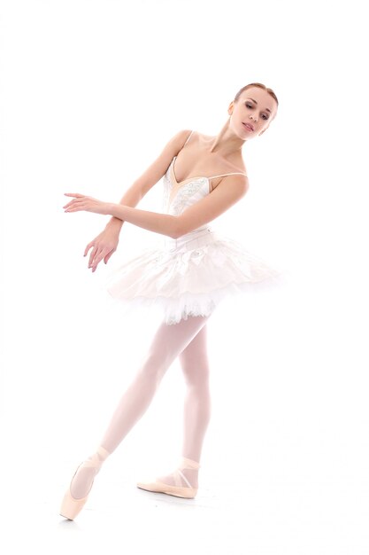 Beautiful and gorgeous ballerina in ballete pose