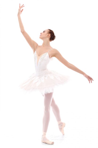 Beautiful and gorgeous ballerina in ballete pose