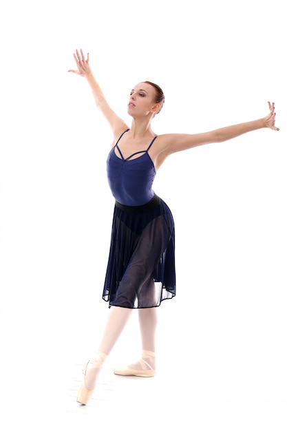 Beautiful and gorgeous ballerina in ballete pose