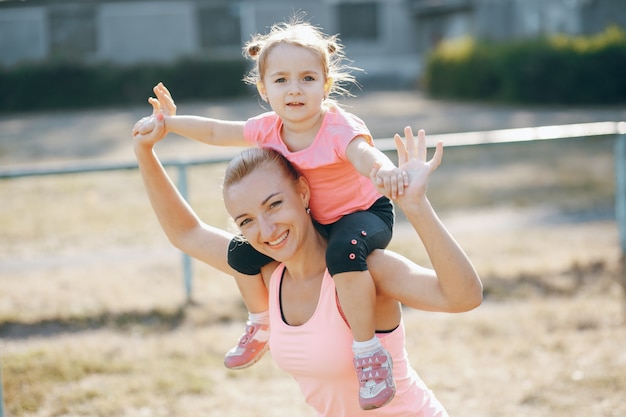 Free photo beautiful grass cheerful mom together