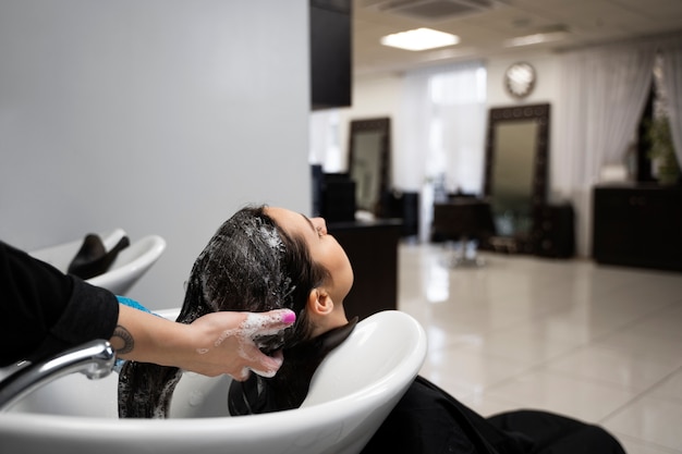 Beautiful hair in the process of keratin treatment