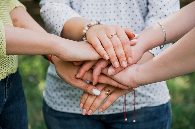 Beautiful hands top view shake with girls