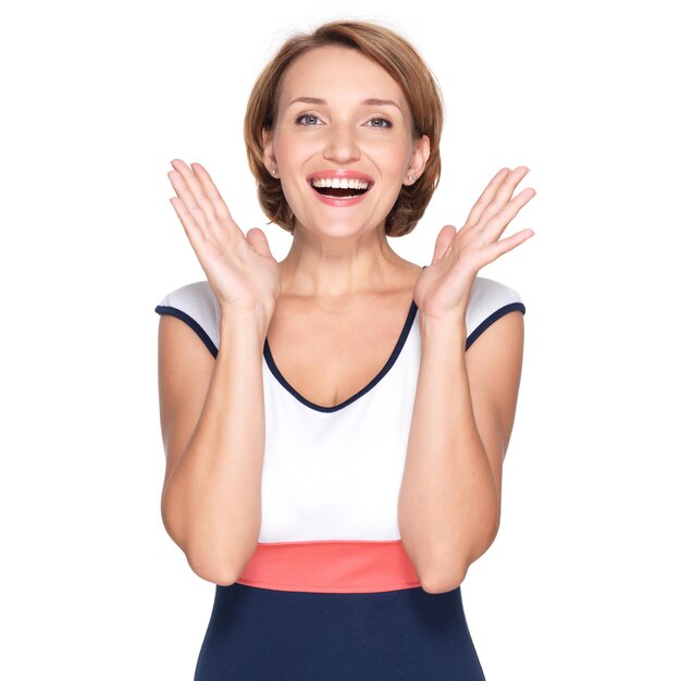 Beautiful happy surprised woman with positive emotions   wall