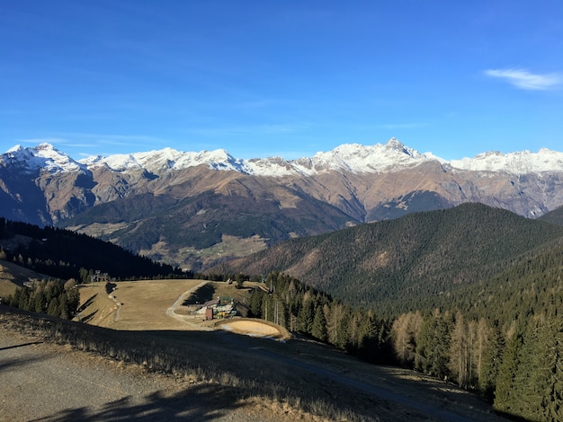 Explore the Stunning Beauty of Mountainous Scenery under a Clear Sky