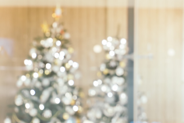 Beautiful holiday decorated room with Christmas tree, out of focus shot for photo background