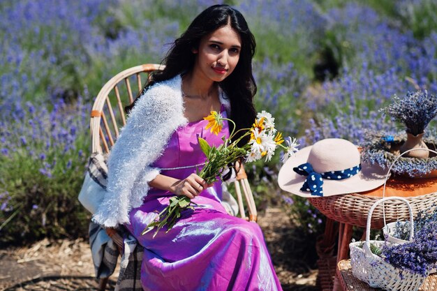 Beautiful indian girl wear saree india traditional dress in purple lavender field