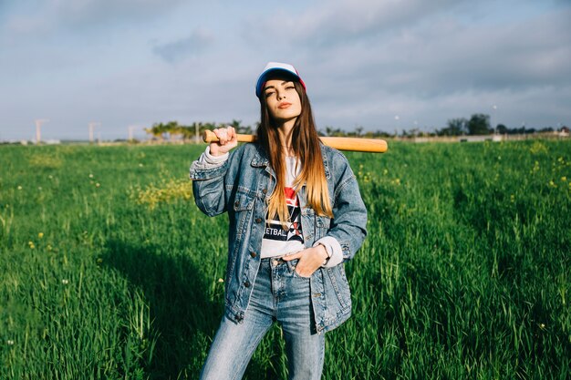 Beautiful lady looking at camera in field