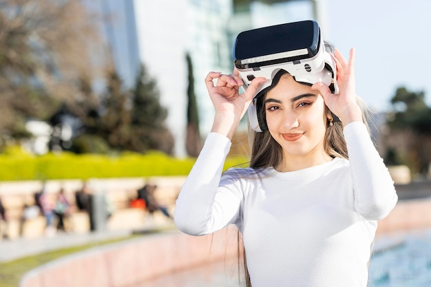 Beautiful lady wears Vr set and looking at the camera High quality photo