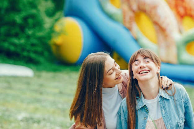 Free photo beautiful ladys walk in the park.