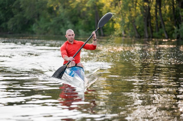 Beautiful landscape with man paddling