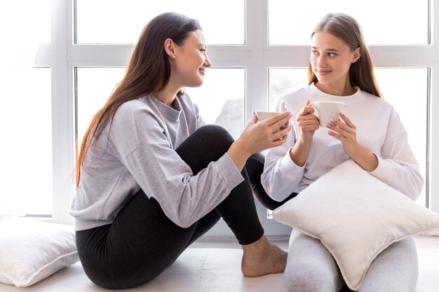 Beautiful lesbian couple looking at each other