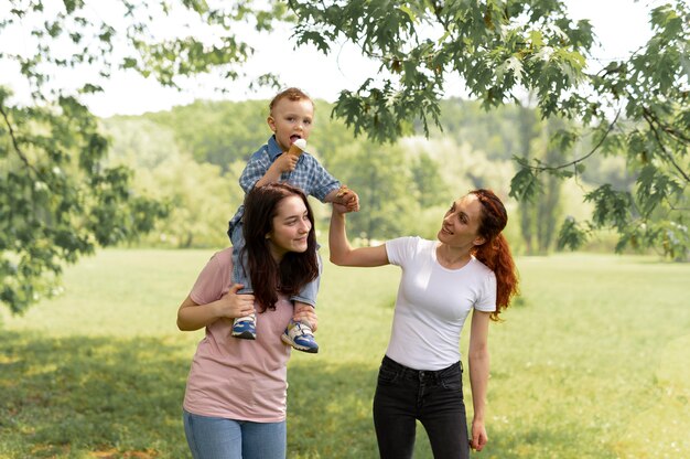 Beautiful lgbt family in the park