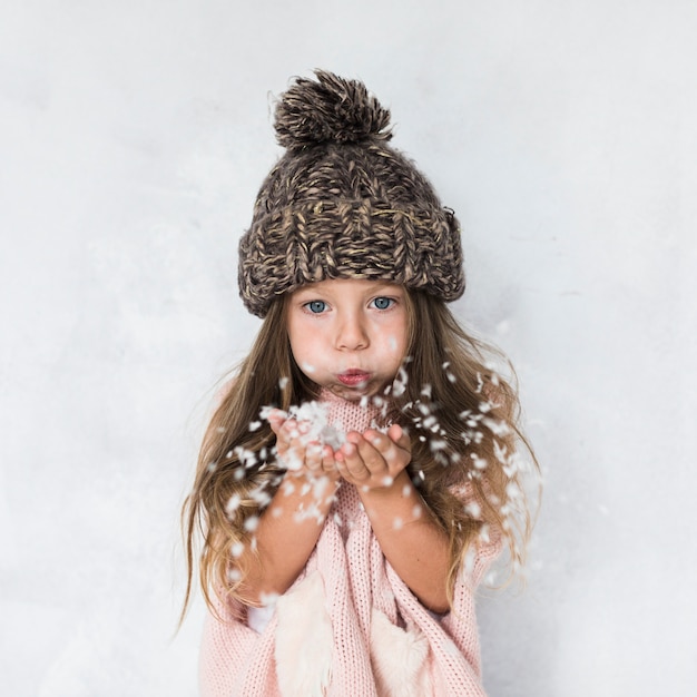 Beautiful little girl bowing flakes