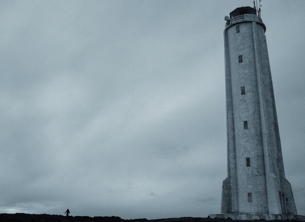 A beautiful low angle shot of a tall lighthouse