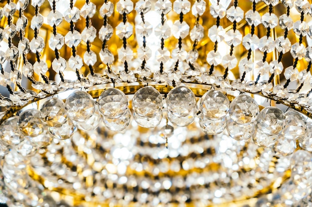 Free photo beautiful luxury crystal chandelier decoration interior