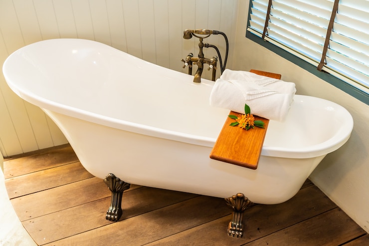 Free Photo beautiful luxury elegance white bathtub decoration interior of bathroom for spa relax