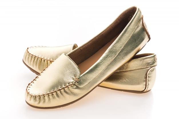 Free photo beautiful luxury fashion golden woman shoes