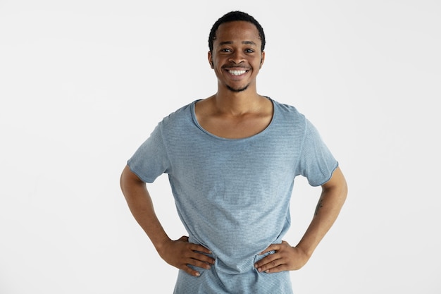 Beautiful male half-length portrait isolated on white studio background.