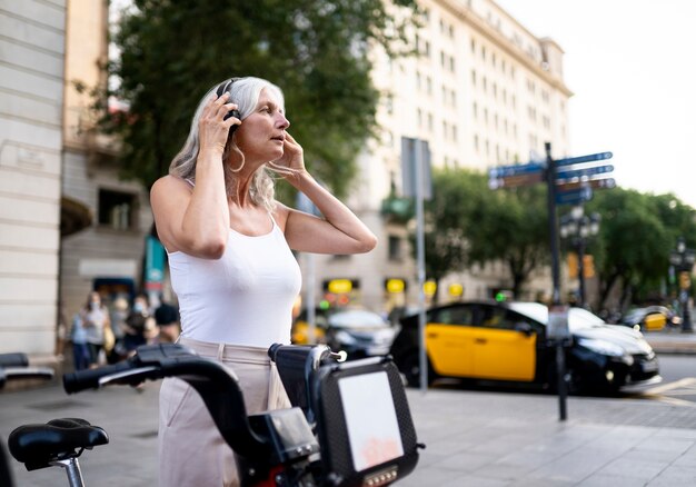 Beautiful mature woman spending time around city