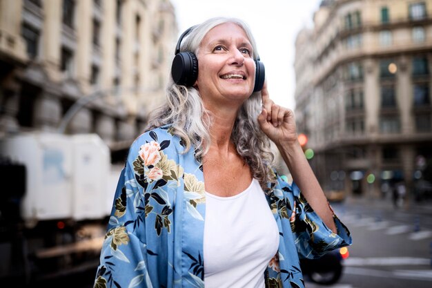 Beautiful mature woman spending time around city