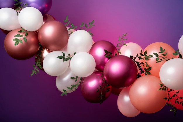 Free photo beautiful metallic balloons with flowers