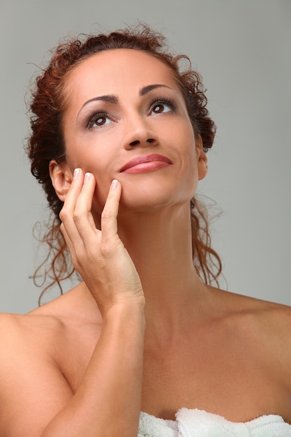 Beautiful middleaged woman in towel