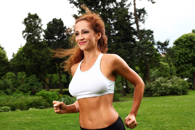 Beautiful middleaged woman working out