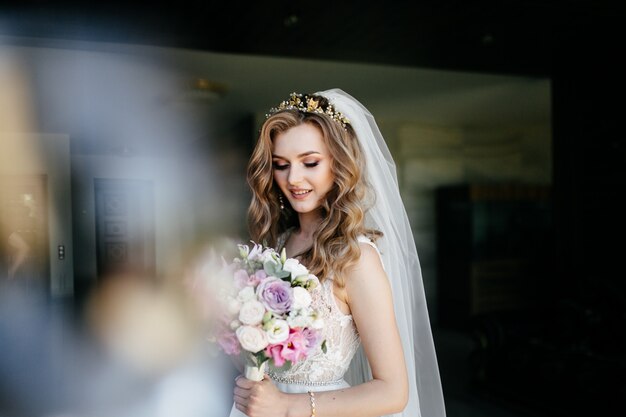 Beautiful model girl in white dress. Man in suit